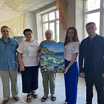 Евгений Смолянинов и Дарья Герасимова посетили школу в Мариуполе